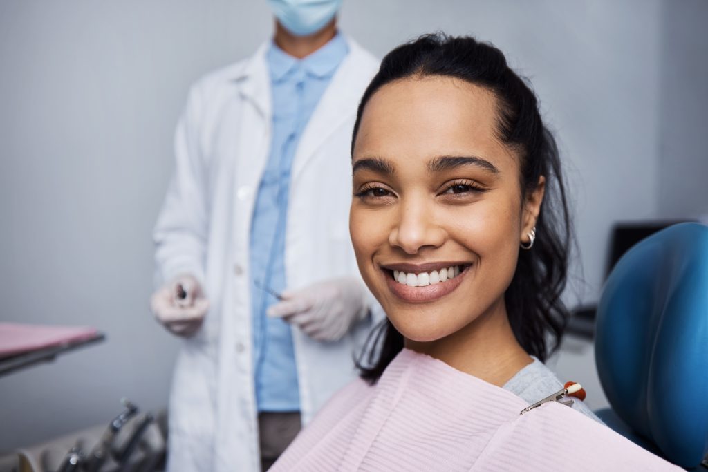 A woman showing off her gum health.